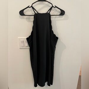 Lulu’s scalloped neckline, black mini dress